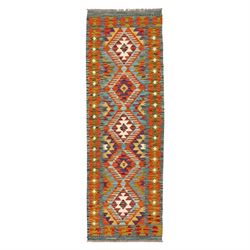 Afghan kilim amber ground runner rug, decorated a central column of repeating lozenge desi...