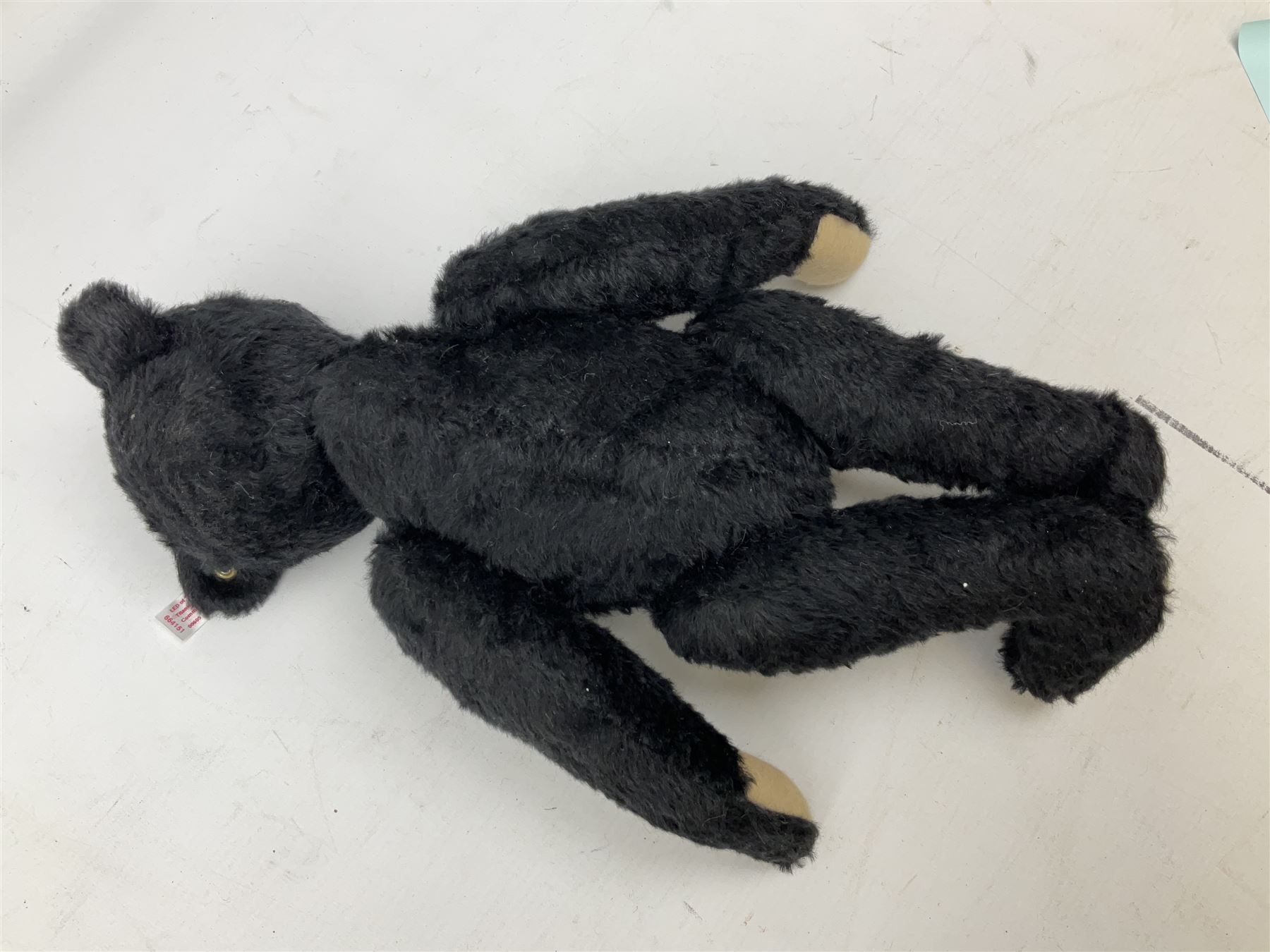 Steiff 'Leo the 1912 Titanic Mourning Bear', in black mohair with tag, limited edition no. 605, with original certificate and box