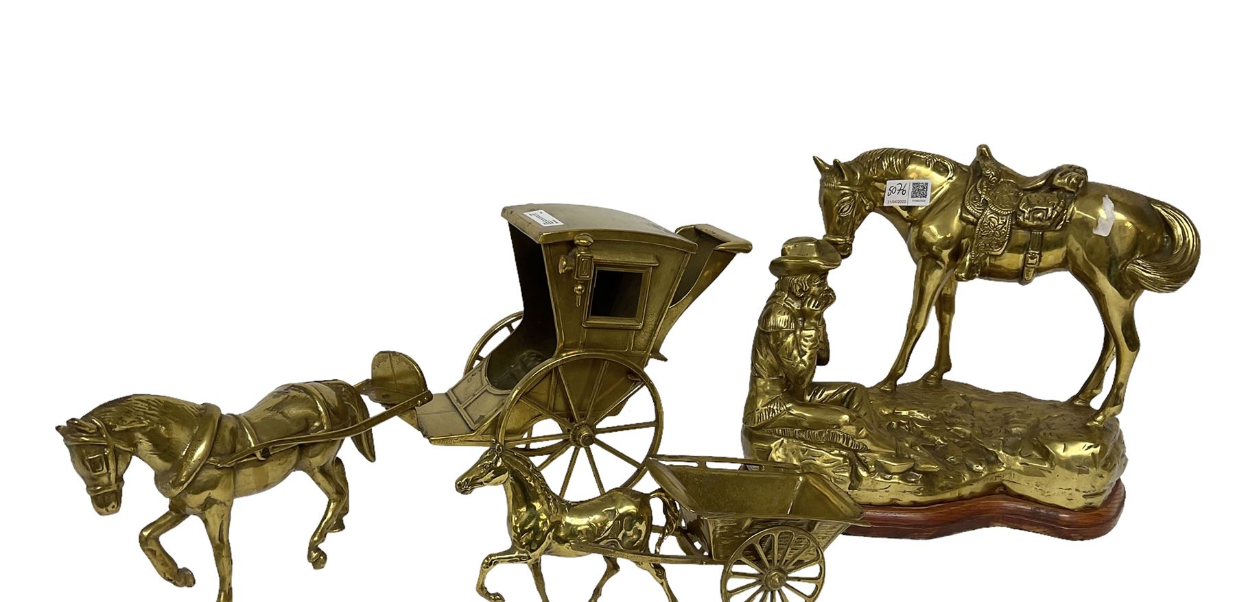Three brass figures, one depicting a cowboy and his horse, two of horses and carts, largest H30cm
