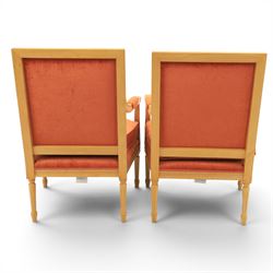 Pair of mid-20th century beechwood fauteuil armchairs, upholstered backrest and seat in terracotta velvet fabric, padded armrests with scroll detail, on tapered fluted supports with carved floral rosette blocks (very modern and not a desirable timber)