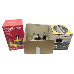 Two juicers, Nutribullet and Omega juicer and Crockpot in box (3)
