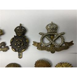 Nineteen Yeomanry metal cap badges including Derbyshire, Northamptonshire, Essex, Glamorgan, Staffordshire, City of London, Surrey, Shropshire, Hertfordshire etc; together with eleven Fusiliers badges including Lancashire, Royal Welch, Northumberland etc (30)