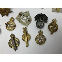 Twenty-six cap badges for Yeomanry and various guards including Fife & Forfar, Lothian and Border Horse, Leicestershire, Northamptonshire, Queens Own, Coldstream, Grenadier, Machine Gun Regiment, Life Guards etc (26)