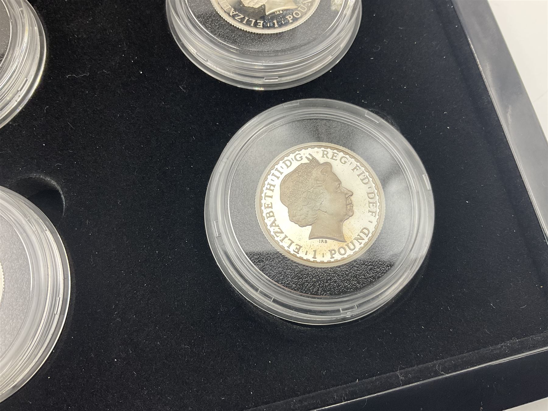 The Royal Mint United Kingdom 2012 'Britannia 25th Anniversary 1987-2012 The Silver Portrait Collection First Strikes' comprising nine half ounce fine silver Britannia coins, cased with certificate