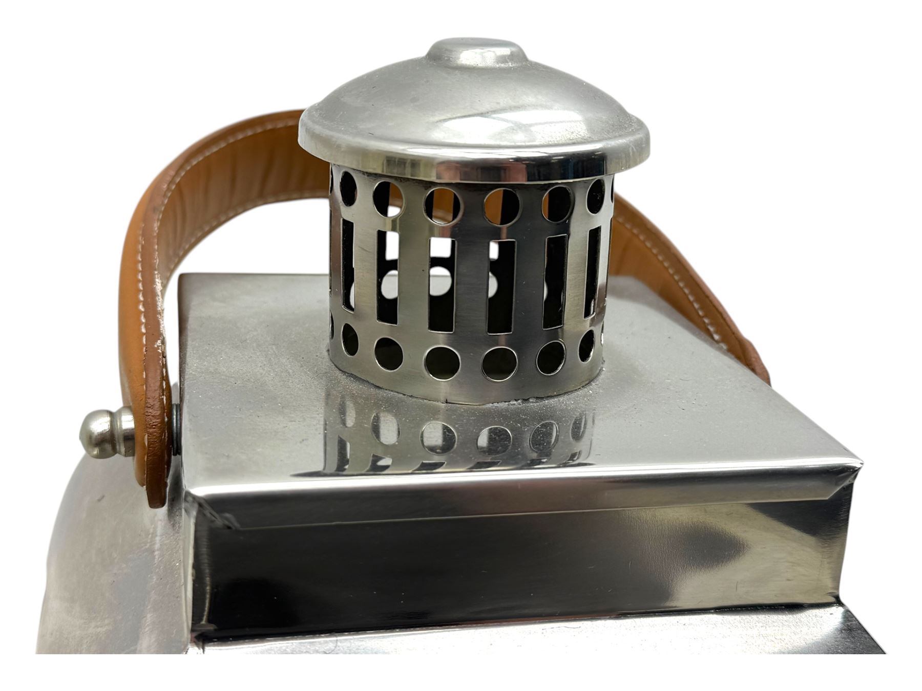 Contemporary painted wooden wine cabinet, rectangular form with carved leaf moulded cornice over single drawer and fifteen bottle compartments, flanked by spiral twist pilasters; together with a cream painted and chrome lantern, with glazed sides and leather handle (2)