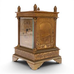 Early 20th century brass mantle clock, the face and case profusely engraved with floral scrolls, the sides inset with hunting scene panels, flanked by four Corinthian columns with acorn finials, striking the hours and halves on bell, H20.5cm W13cm