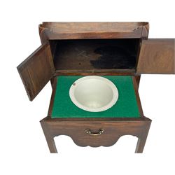 George III mahogany night commode, tray top with raised sides pierced with handles, fitted with cupboard over pull-out commode, shaped apron, on square moulded supports