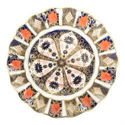 Royal Crown Derby Imari pattern 1128, two plates with fluted rim, together with Royal Crown Derby platter in pattern 6299, plates D22cm