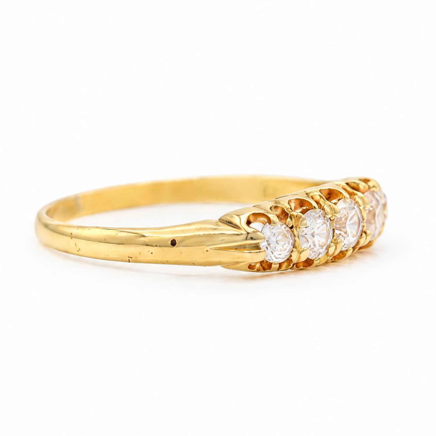 Early 20th century 18ct gold diamond ring, set with five old cut diamonds, total diamond weight approx 0.35 carat