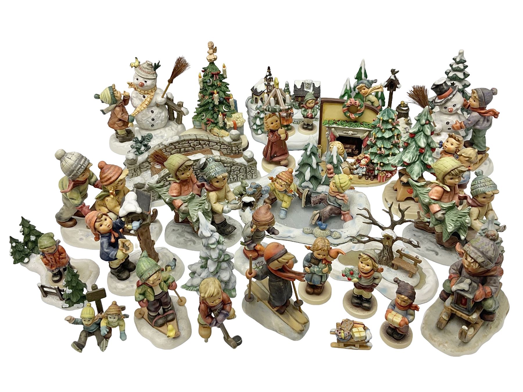 Large collection of Christmas themed Hummel figures and Hummel scapes by Goebel, to include Winter Friend, Making New Friends, Tree Trimming Time, Winter Adventure etc