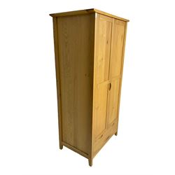 Oak double wardrobe, fitted with drawer to base