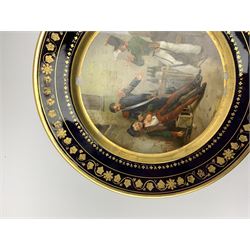 19th century Rihouet Paris porcelain cabinet plate, decorated with a central panel illustrating three French soldiers around a bottle laden table, one surveying a note, within a dark blue gilt detailed border, with French inscription verso, and red printed mark Rihouet Rue de la Paix A Paris and green fish mark, possibly for Perche, D23cm 



