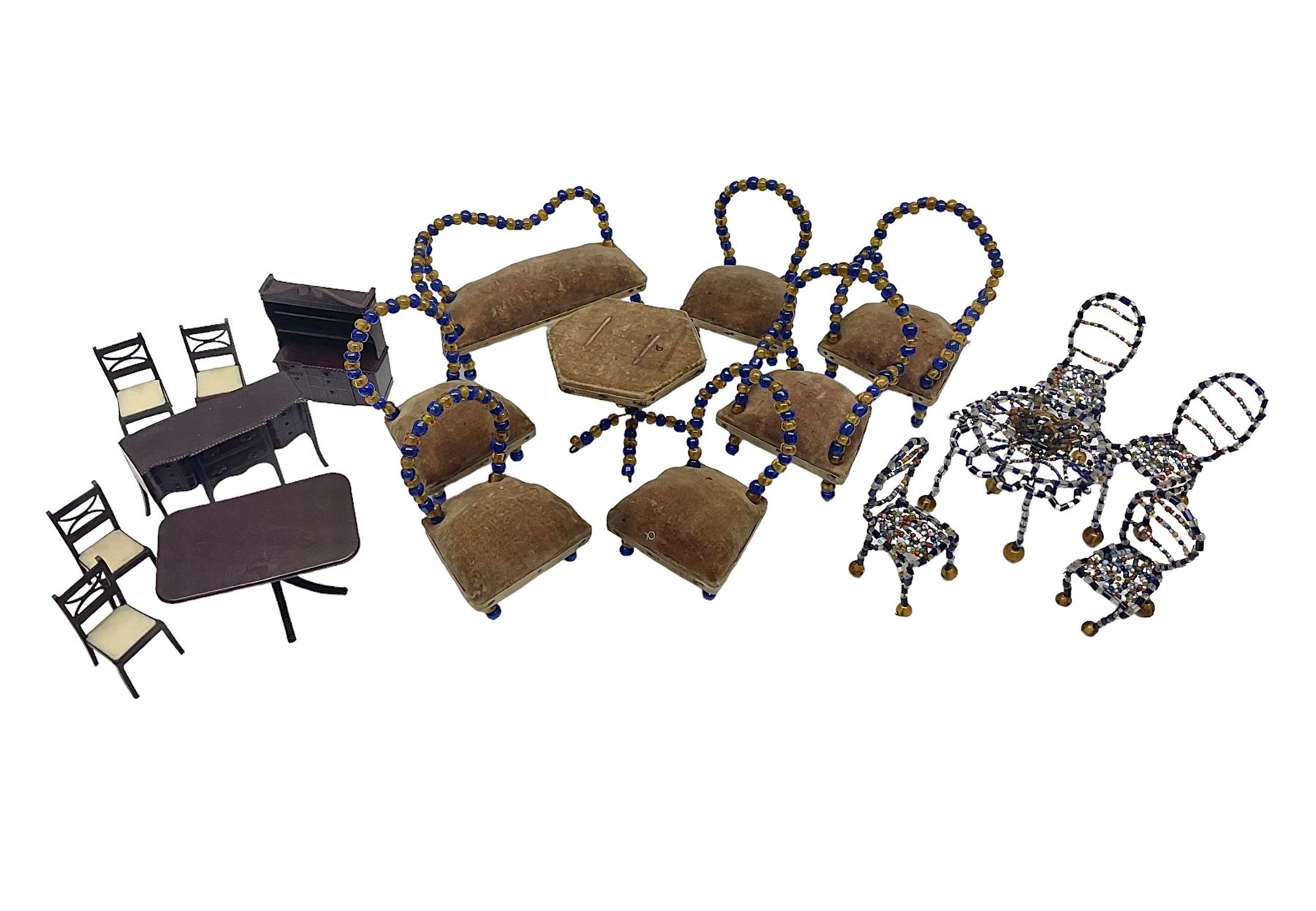 Quantity of early 20th century doll's house furniture comprising Victorian style beadwork and upholstered eight-piece salon suite; beadwork dining table with four matching chairs; and Kleeware brown plastic seven-piece dining suite