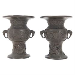 Pair of Japanese bronzed vases, decorated in relief with with birds and dragons, with dragon head handles, H13cm