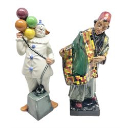 Two Royal Doulton figures, comprising Carpet Seller HN1464 and Balloon Clown HN2894, tallest H24cm