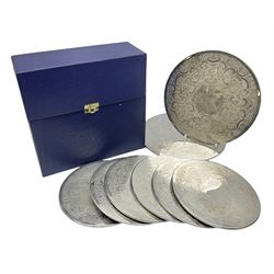 Set of eight silver plated placemats, ea