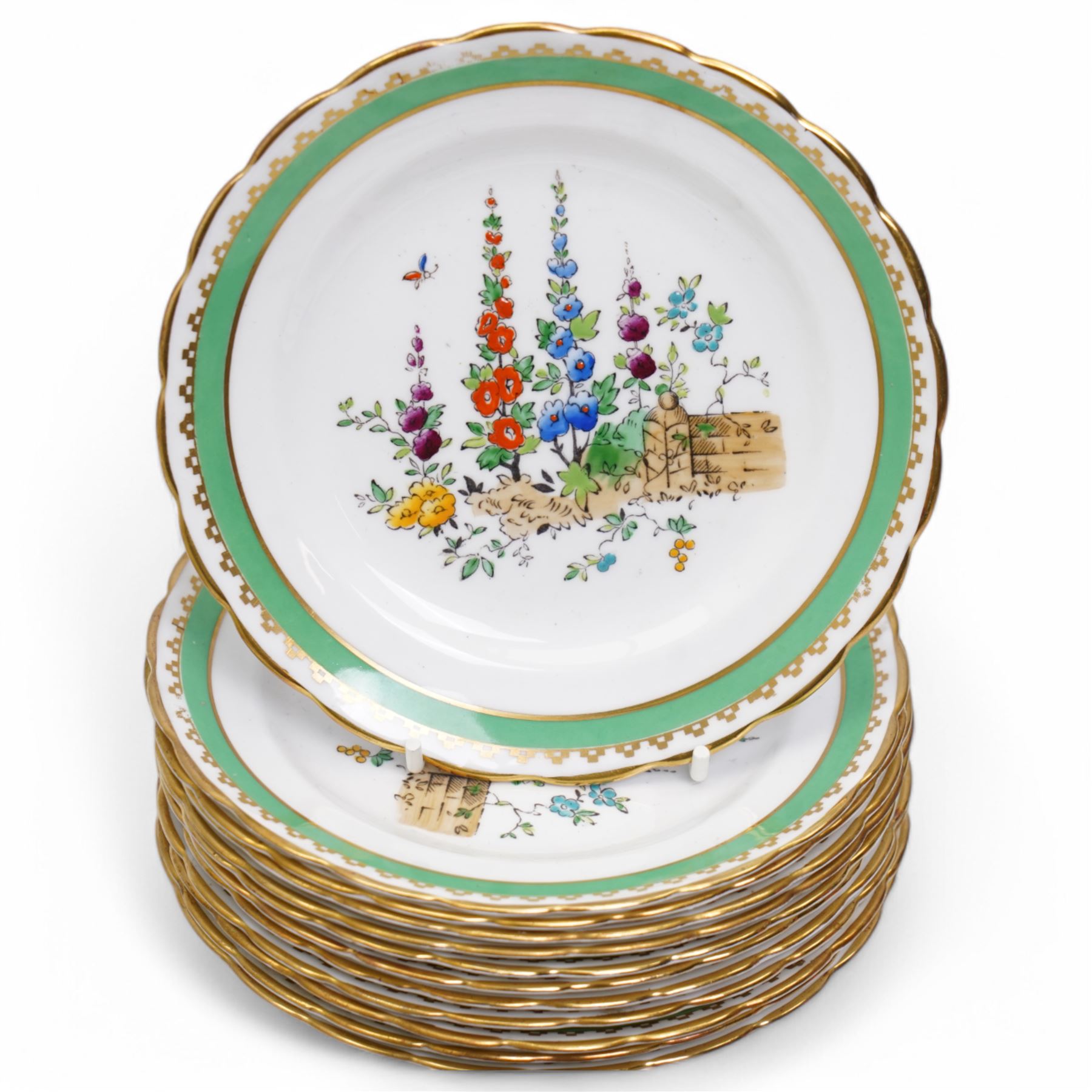 1930s Plant & Co Tuscan china tea set painted with flowers in blue, pink etc within a green border comprising twelve cups and saucers, twelve plates, two bread and butter plates, milk jug and sugar bowl (40)