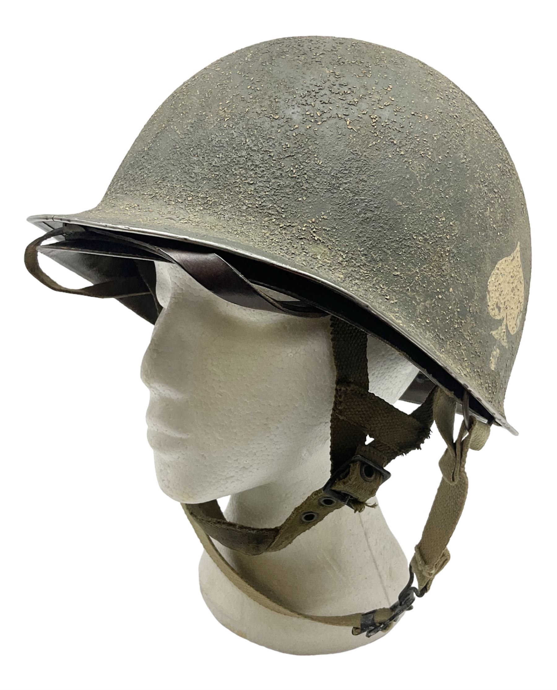 American first type paratrooper helmet with post-WW2 strap and D-rings and later 1944 liner bearing Firestone Tyre and Rubber Company mark; green textured finish