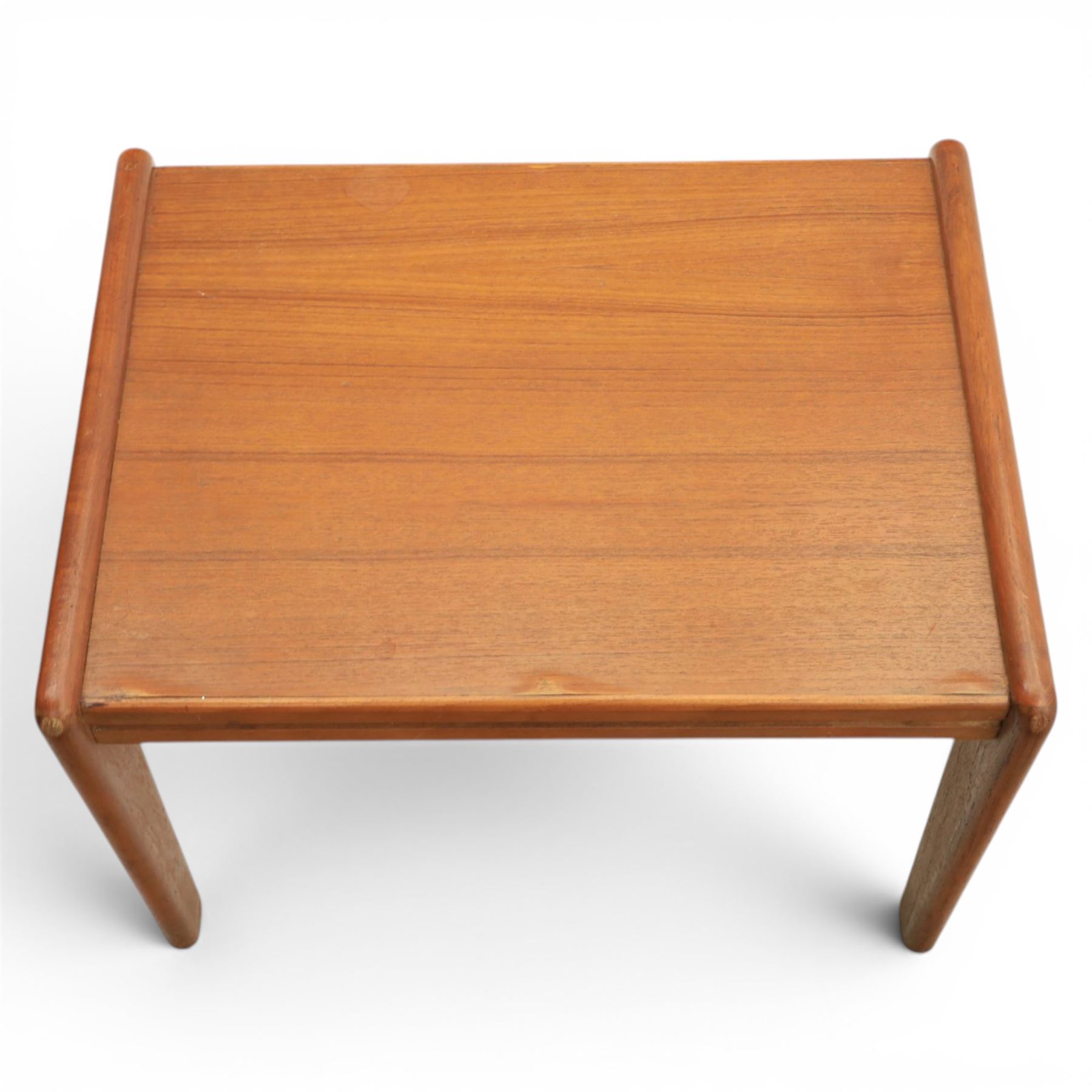 A pair of Nathan 'Highback Carvers' and a 20th century nest of teak tables, (Tables W65cm, D38cm, H49cm)
(Carvers W57, H97)