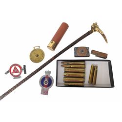 Walking stick with carved monkey handle, glass shooting flask in the form of a cartridge, bullet casings and other collectables