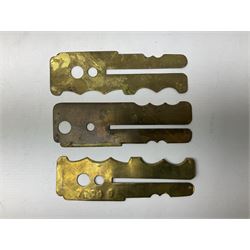 Three war department brass uniform protector button polisher, one marked 650097