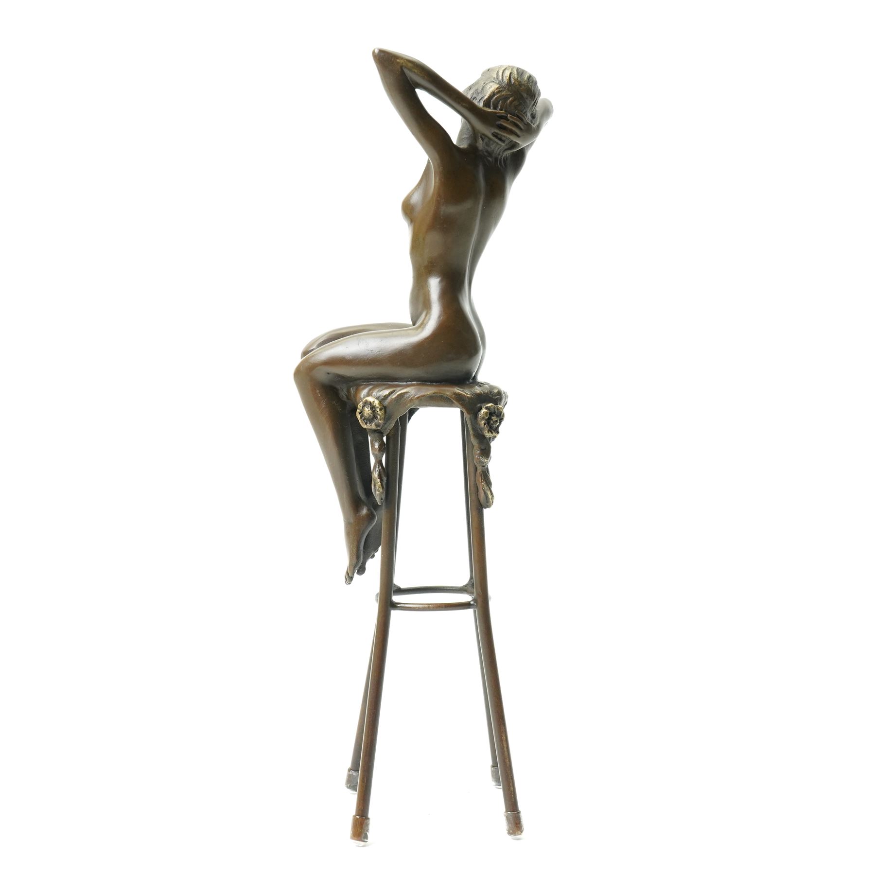 After D H Chiparus, an Art Deco style bronze modelled as a nude female figure seated upon a chair, H28cm.