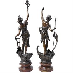 Pair of 19th century spelter male and female figures representing agriculture and fiscing on wooden bases H68cm