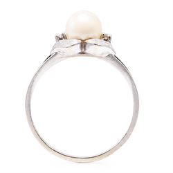 14ct white gold pearl and diamond three stone ring, single cultured white / cream pearl with a single cut diamond set either side, stamped 585
