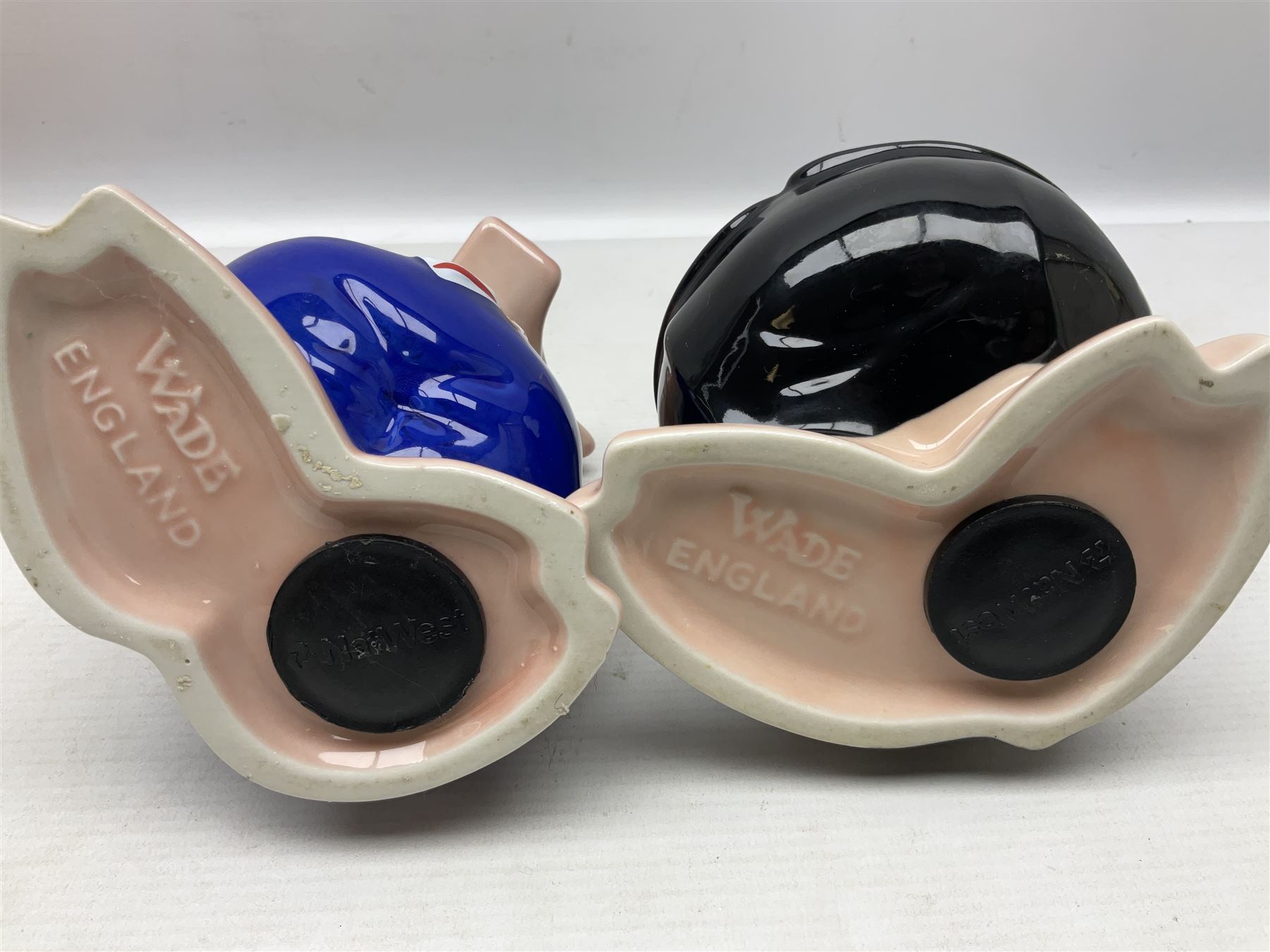 Set of five Wade NatWest money boxes, comprising father, mother, boy, girl and baby, four with original boxes 