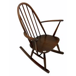 Ercol stick back rocking chair and an ercol tub shaped chair with seat and back cushion 