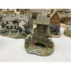 Eight Lilliput Lane limited edition Beatrix Potter models, including Buckle Yeat, Tabitha Twitchits Shop and Ginger Pickles Shop, together with twelve Lilliput Lane models from the Blaise Hamlet collection, including Dial Cottage, Diamond Cottage and Vine Cottage, all with deeds and original boxes (20)