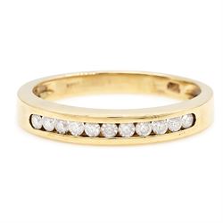 18ct gold diamond half eternity ring, channel set with eleven round brilliant cut diamonds...