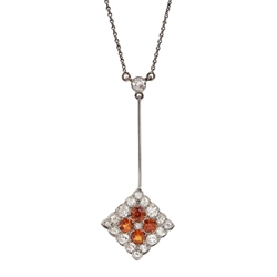 Early 20th century 18ct white gold, milgrain set old cut diamond and orange garnet pendant, on silver chain necklace stamped 925