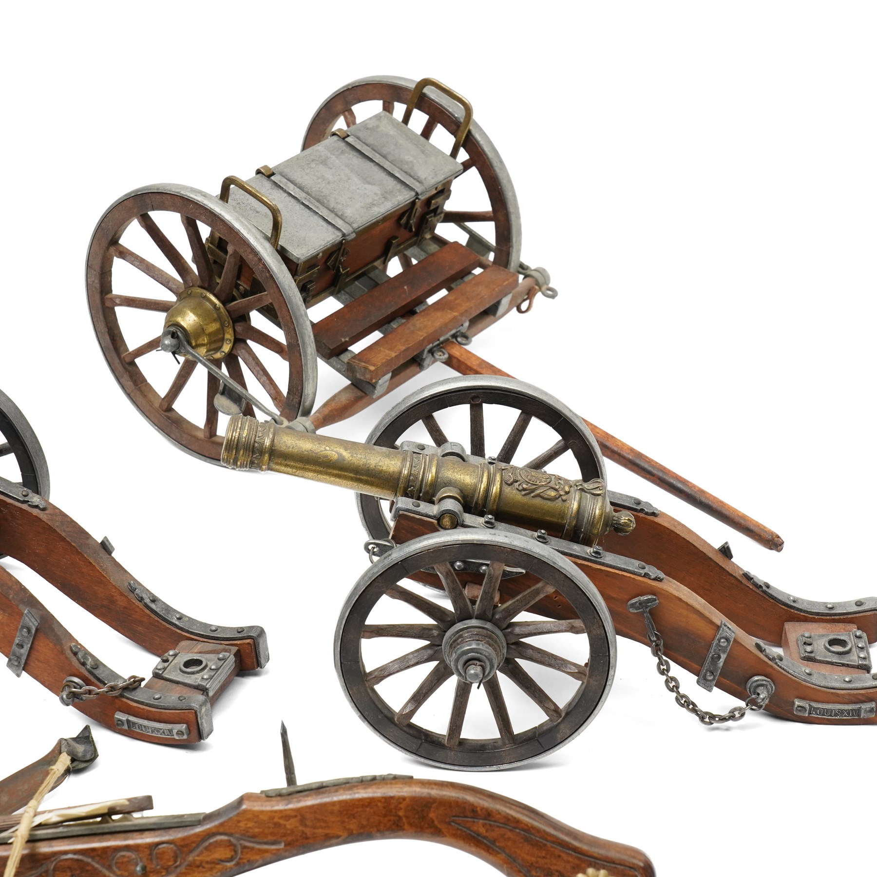 Six scale wood and metal models of cannons, length of longest 32cm together with a gun carriage and model crossbow
