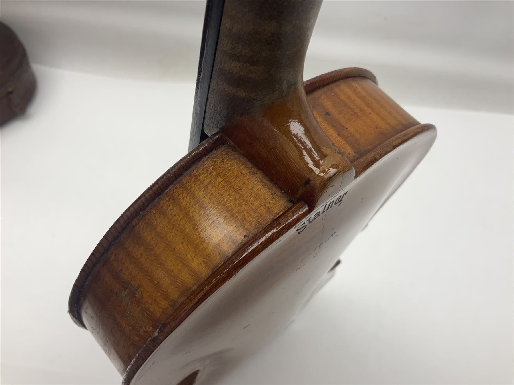 German violin c1900 stamped Stainer with 36cm two-piece maple back and ribs and spruce top L59.5cm overall; in simulated reptile skin carrying case