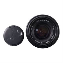 Eight camera lenses, comprising Canon Ultrasonic Zoom EF 75-300mm 1:4-5.6 lens, AF Nikkor 35-70mm 1:3.3-4.5 lens, Nikkor 60-180mm 1:4.5-5.6 lens, Canon Zoom EF 28-80mm 1:3.5-5.6 lens, Canon Zoom EF 80-200mm 1:4.5-5.6 lens, Sigma 70-300mm 1:4.6-5.6 DL Macro, Sigma Zoom 70-210mm 1:4-5.6 UCII lens and a Sigma AF 70-300mm 1:4-5.6 APO Macro lens, all with lens caps