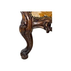 Victorian design stained wood three seater settee, top rail carved and scrolled, padded back and arms, scrolled cabriole feet 