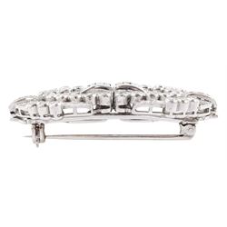 Early - mid 20th century platinum diamond brooch / hair clips, each clip set with round and baguette cut diamonds, in an openwork setting, joined by a 9ct white gold detachable brooch, total diamond weight approx 2.35 carat