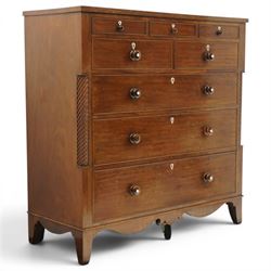 Large 19th century mahogany chest, with rectangular top with inlay flanked by spiral turned uprights, three short drawers above two short and three graduating long drawers, bone escutcheons and turned wooden handles, shaped apron raised on bracket feet 
