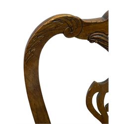 George II elm side chair, shaped foliate carved cresting rail over pierced splat carved with linenfold swag, the seat upholstered in embossed leather cover with foliate scroll decoration, moulded seat rails over acanthus carved cabriole supports with scroll carved terminals