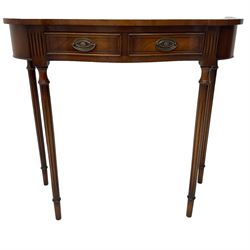Regency design mahogany serpentine console table, fitted with single drawer disguised as two with cockbeaded facia, raised on fluted tapering supports