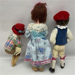 Anna Meszaros Hungary - five hand made needlework figurines including goose girl with stick H20cm; shepherdess in a sitting pose playing a penny whistle with a lamb on her knee; young girl holding a flowerpot; and two others (5)  Auctioneer's Note: Anna Meszaros came to England from her native Hungary in 1959 to marry an English businessman she met while demonstrating her art at the 1958 Brussels Exhibition. Shortly before she left for England she was awarded the title of Folk Artist Master by the Hungarian Government. Anna was a gifted painter of mainly portraits and sculptress before starting to make her figurines which are completely hand made and unique, each with a character and expression of its own. The hands, feet and face are sculptured by layering the material and pulling the features into place with needle and thread. She died in Hull in 1998.