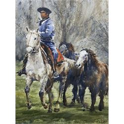 Diego Ferrer (Argentinian Contemporary):  Gaucho and Three Horses, watercolour signed and dated '24, 67cm x 50cm