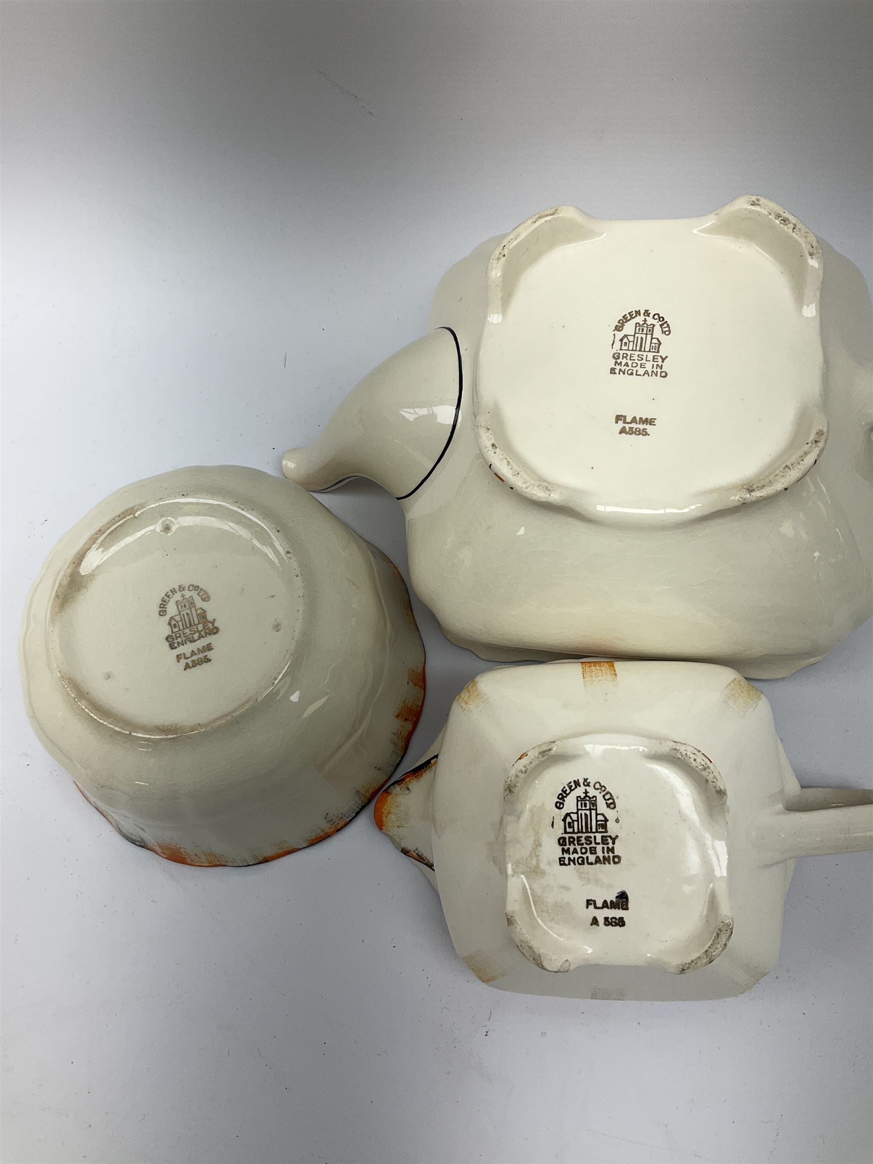 Two Royal Crown Derby pattern Imari soup bowls, pattern 2451, Belleek Fermanagh Ireland four piece set in green shamrock pattern, Royal Doulton small lady figure, Marie HN1370, large Wedgwood fruit bowl, Sylvac jardiniere in autumn leaves pattern, five pieces Co-operative Society commemorative ceramics, with selection of other ceramics. 