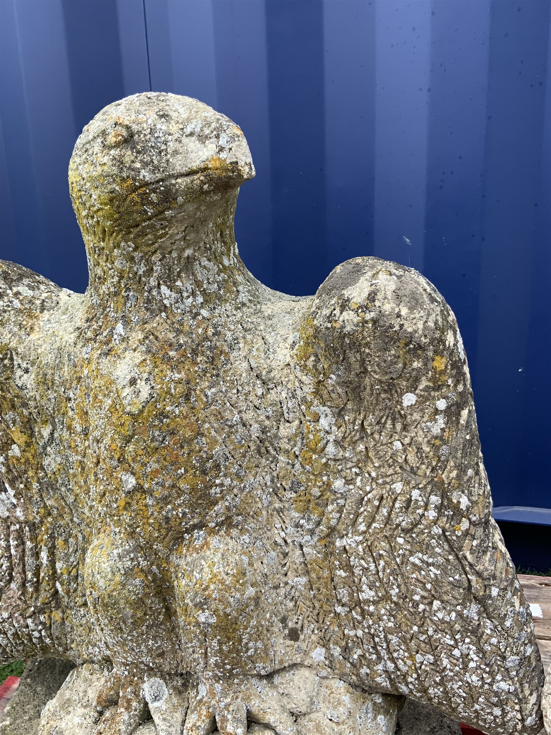 Pair composite stone perched eagle figures/gate post toppers with spread wings, on hexagonal slab base - THIS LOT IS TO BE COLLECTED BY APPOINTMENT FROM DUGGLEBY STORAGE, GREAT HILL, EASTFIELD, SCARBOROUGH, YO11 3TX