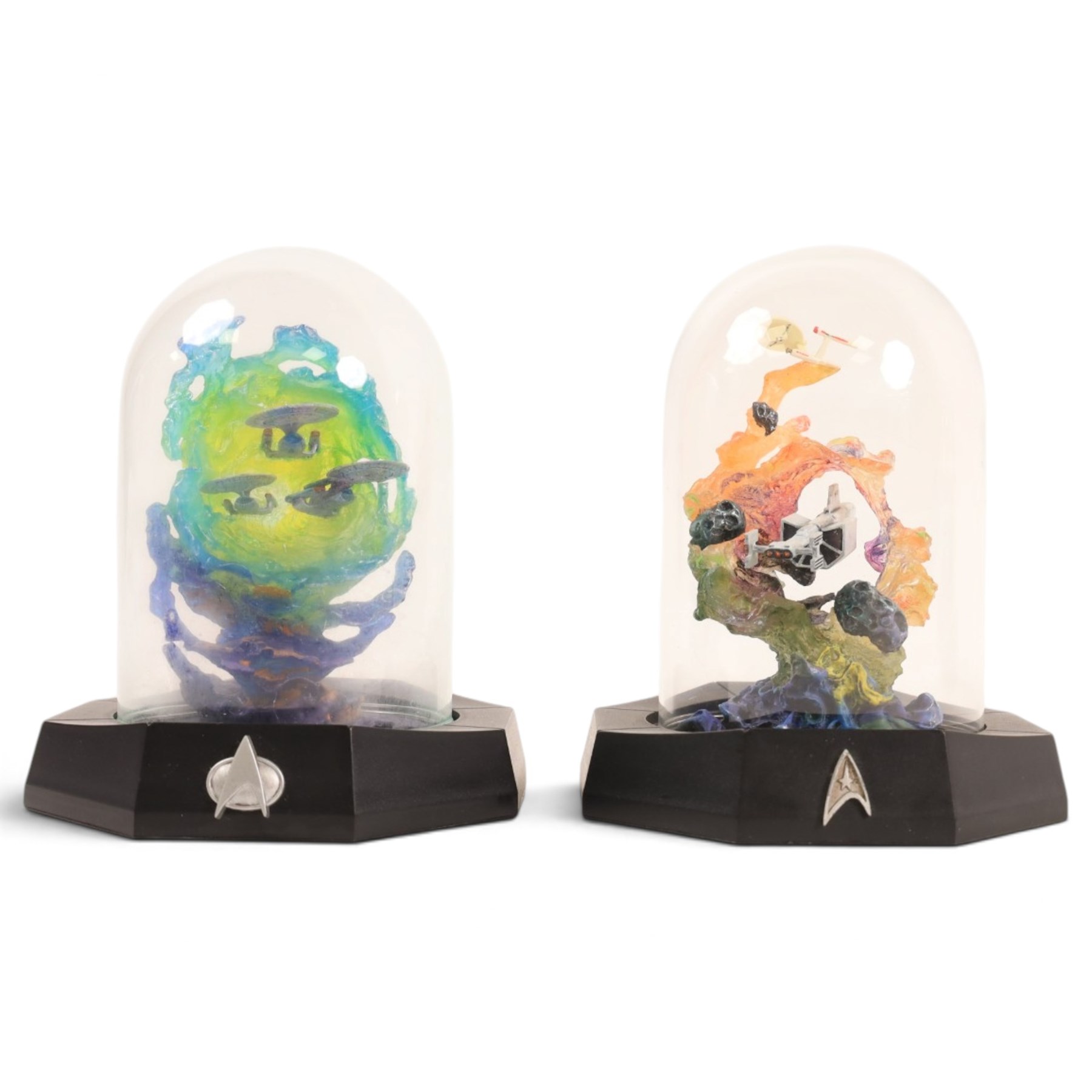 Franklin Mint limited edition Star Trek collectables, comprising seven miniature dioramas under display domes, The USS Enterprise Bold New Millennium large collectors plate, Crystal Edition Galaxy collectors plate and a talking series collectors plate