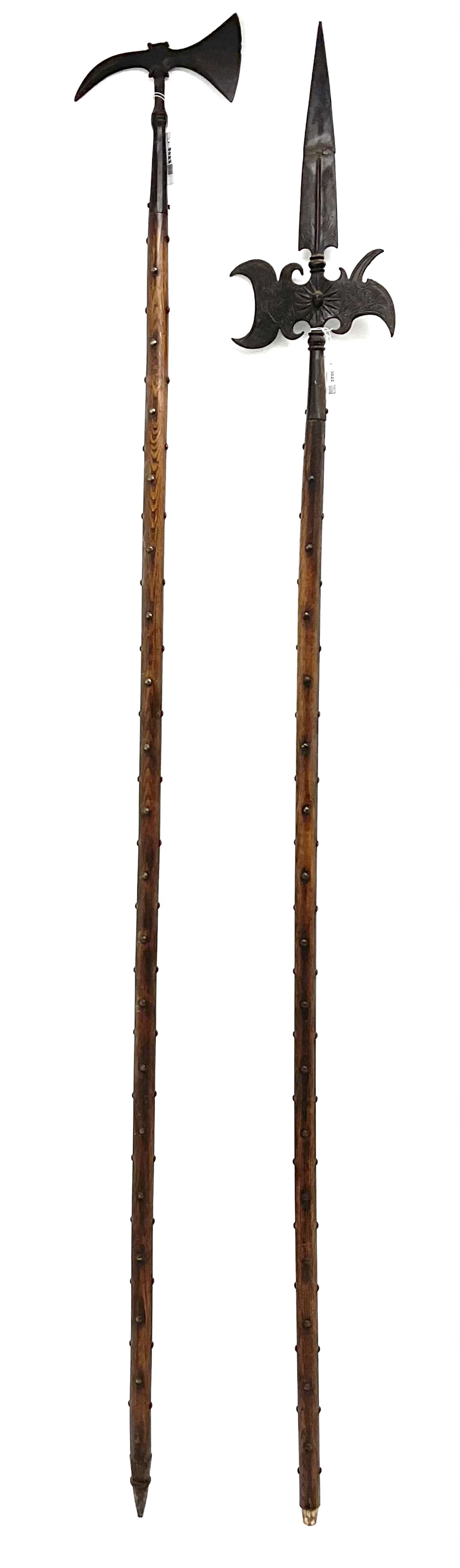 Large continental steel halberd axe the engraved blade with cast sunburst centre and long studded ash handle L219cm; and another halberd with plain ribbed blade and studded ash handle with ground spike (2)