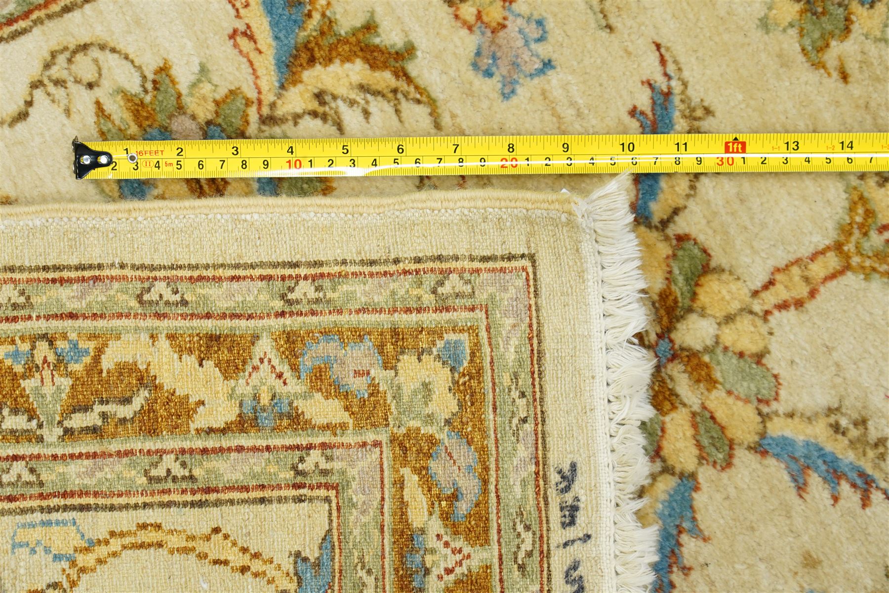 Modern Pakistani Oushak style hand-knotted runner,  ivory field with an all-over scrolling floral vine design incorporating stylized palmettes and rosettes in soft tones of pale blue, sage green and muted gold, enclosed by conforming border, cotton fringe ends 