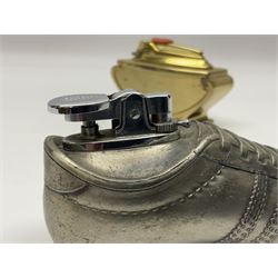 Ronson gilt metal table lighter, together with a silver-plate table lighter in the form of a football boot