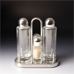 Collection of Alessi items, comprising a 'Juicy Salif' lemon squeezer designed by Philippe Starck, a condiment set designed by Ettore Sottsass, two 'Carlo - a ghost on top of a bottle' designed by Mattia Di Rosa, and further items, all stamped (10)